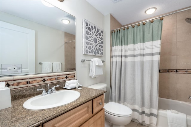 bathroom featuring vanity, toilet, and shower / tub combo with curtain