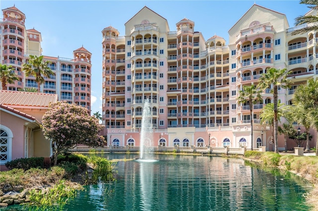 view of building exterior featuring a water view