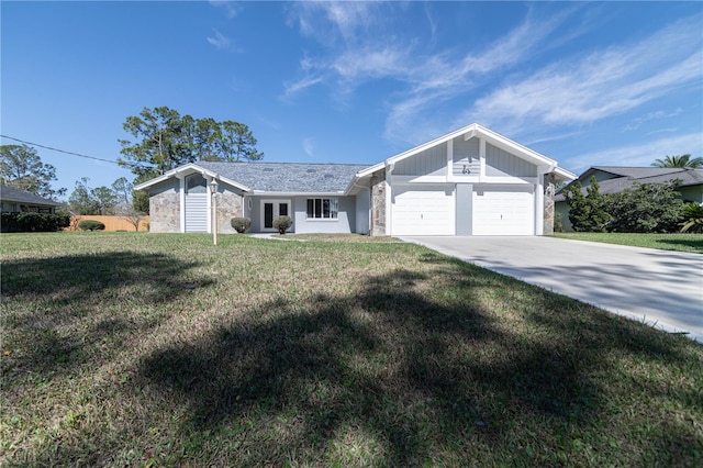 ranch-style house featuring a garage, a front yard, stone siding, and driveway