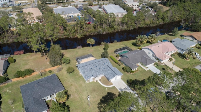 aerial view with a water view and a residential view