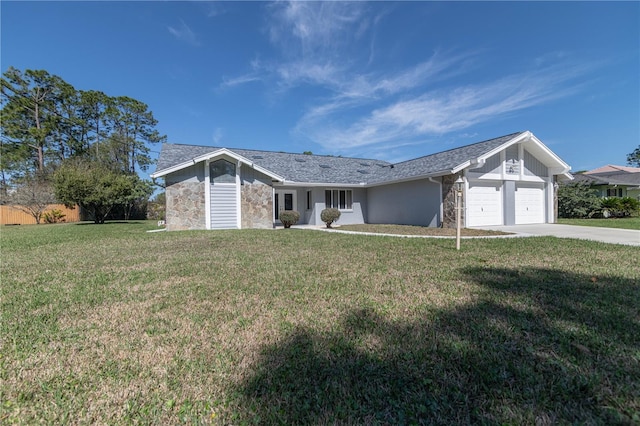 single story home featuring stone siding, a front lawn, and an attached garage