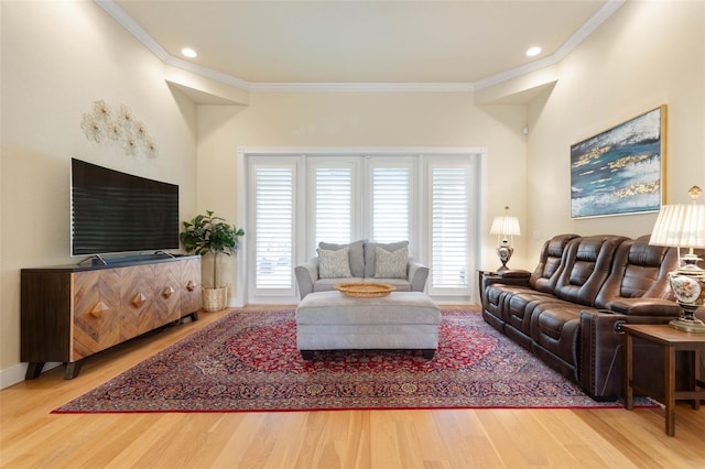 living room with ornamental molding, wood finished floors, and recessed lighting