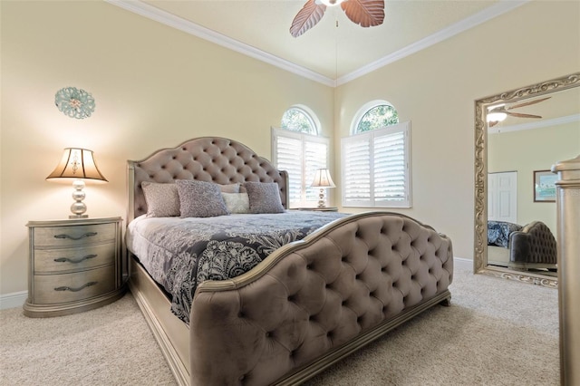 bedroom with ornamental molding, carpet, a ceiling fan, and baseboards