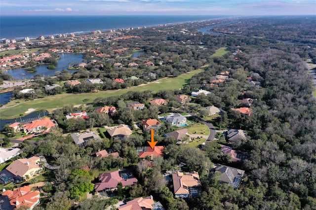 aerial view with a residential view and a water view