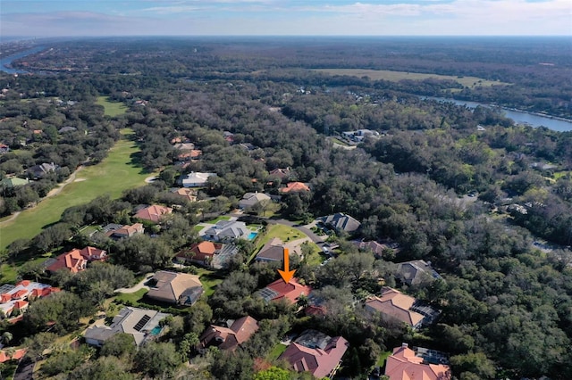 bird's eye view featuring a water view, a wooded view, and a residential view