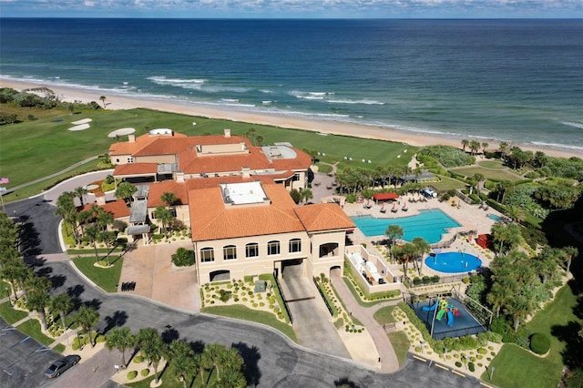 aerial view featuring a view of the beach and a water view