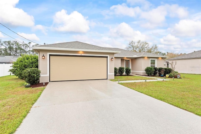 single story home featuring a garage, concrete driveway, a front lawn, and stucco siding