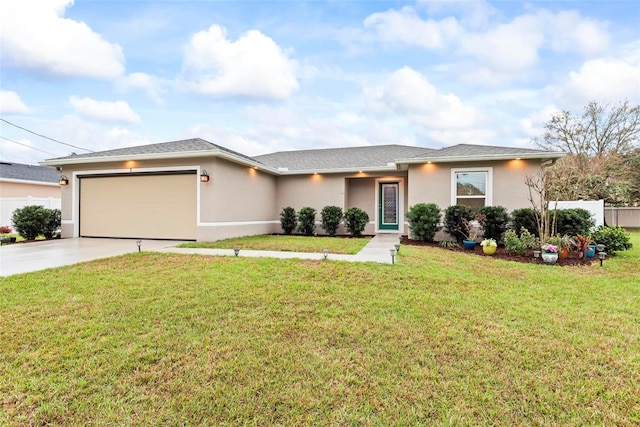 view of front of home featuring a garage, a front yard, driveway, and stucco siding