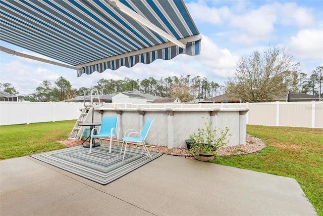 view of patio featuring a fenced backyard and a swimming pool