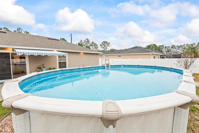 view of pool featuring a fenced in pool and a fenced backyard