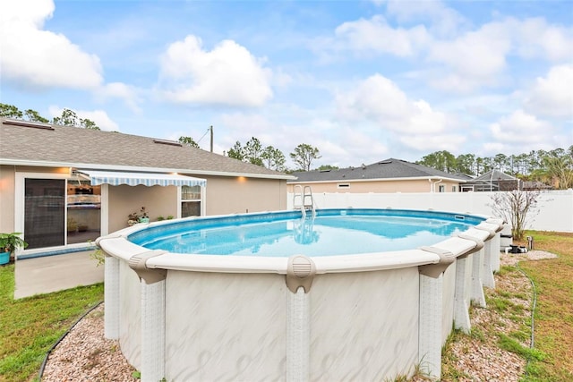 view of pool featuring a fenced backyard and a fenced in pool