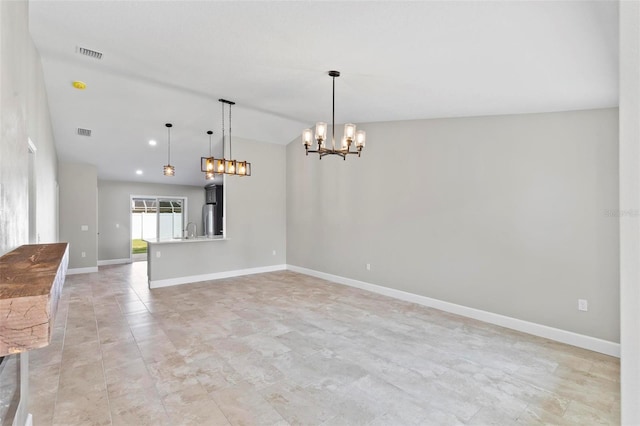 spare room with a notable chandelier, lofted ceiling, visible vents, a sink, and baseboards