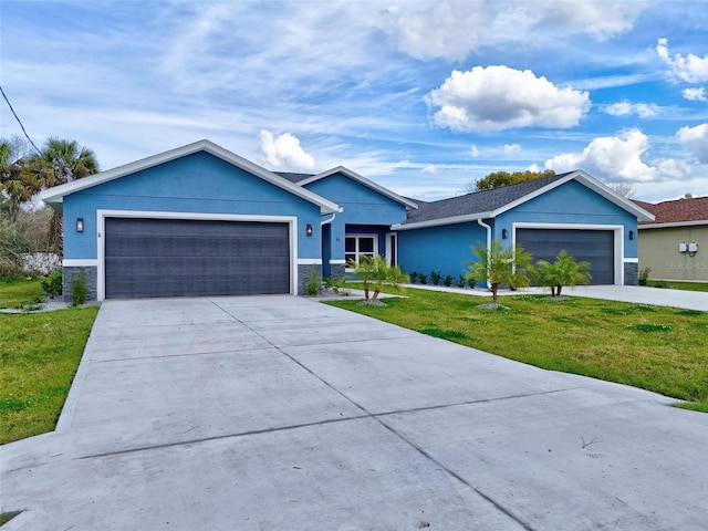 single story home featuring stucco siding, concrete driveway, a front yard, a garage, and stone siding