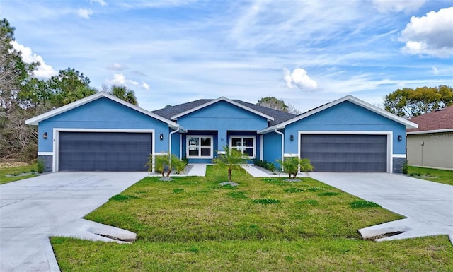 single story home featuring a garage, concrete driveway, and stucco siding