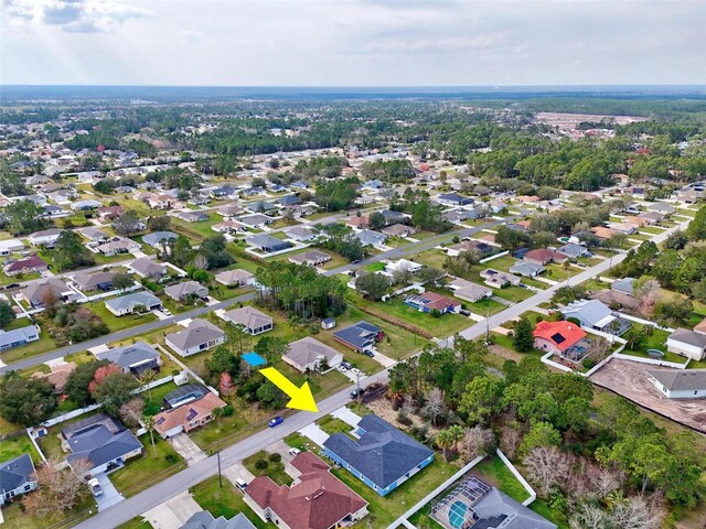 drone / aerial view with a residential view