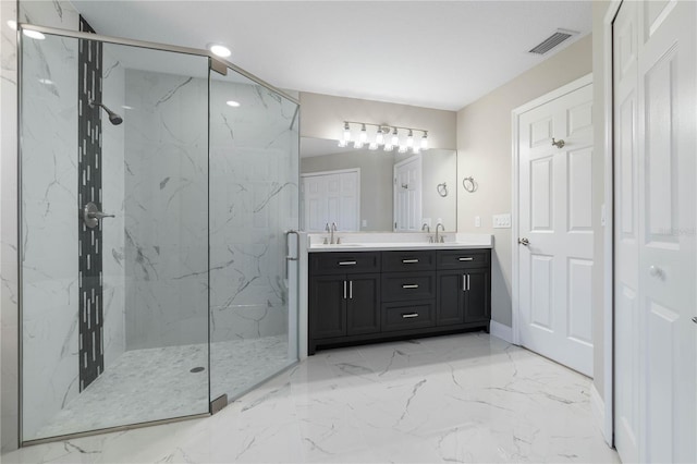 bathroom featuring double vanity, a marble finish shower, visible vents, marble finish floor, and a sink