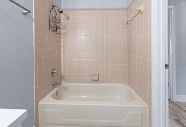 bathroom with  shower combination and wood finished floors