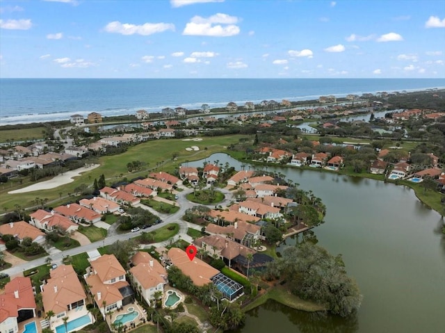 aerial view with a residential view and a water view