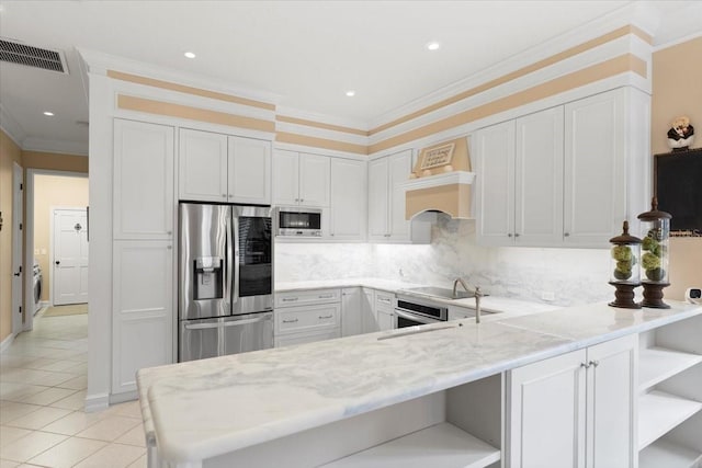 kitchen featuring visible vents, premium range hood, open shelves, appliances with stainless steel finishes, and crown molding