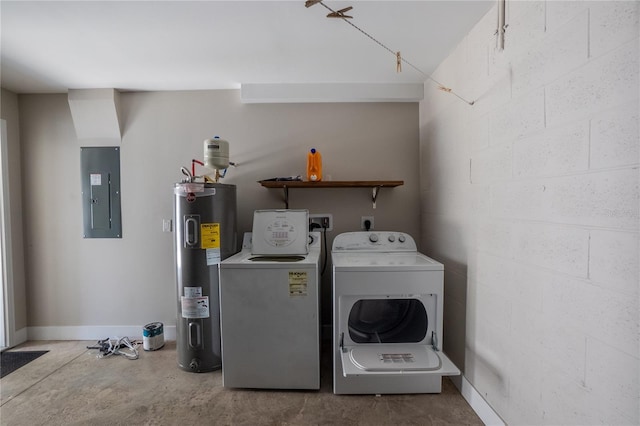 washroom with concrete block wall, electric panel, baseboards, water heater, and separate washer and dryer