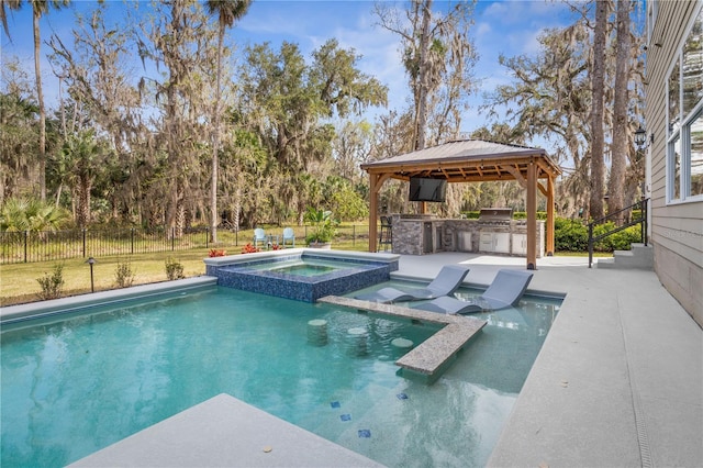 view of pool featuring area for grilling, a fenced backyard, a grill, a gazebo, and a pool with connected hot tub