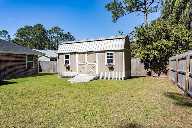 view of shed featuring a fenced backyard