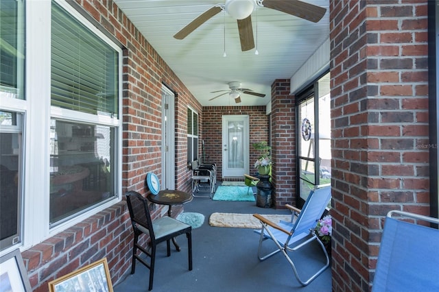 view of patio featuring a ceiling fan and a porch