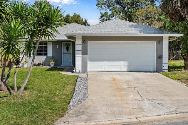 ranch-style home featuring a garage, roof with shingles, a front yard, and stucco siding