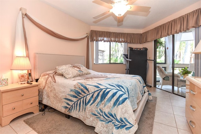 bedroom featuring light tile patterned flooring and a ceiling fan