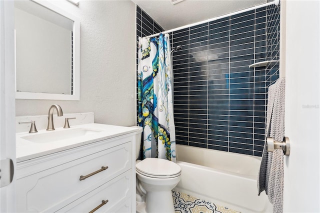 bathroom with shower / tub combo with curtain, a textured wall, toilet, vanity, and a textured ceiling