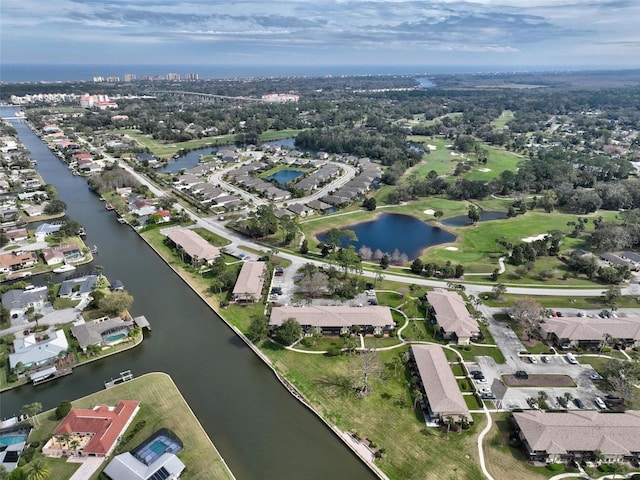 bird's eye view featuring a residential view and a water view