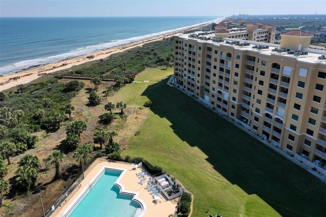 aerial view with a beach view and a water view