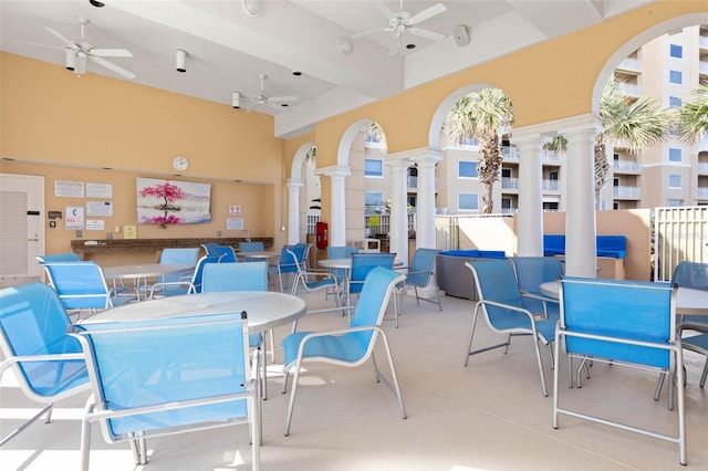 view of patio / terrace with outdoor dining area and a ceiling fan