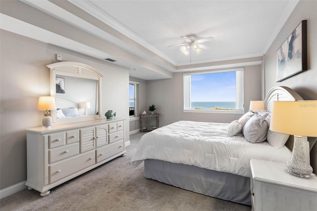 bedroom with crown molding, visible vents, light carpet, ceiling fan, and baseboards