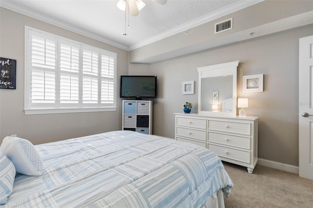 bedroom with crown molding, visible vents, light carpet, ceiling fan, and baseboards