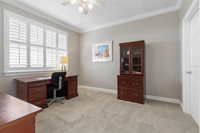 home office with light carpet, baseboards, ornamental molding, and ceiling fan