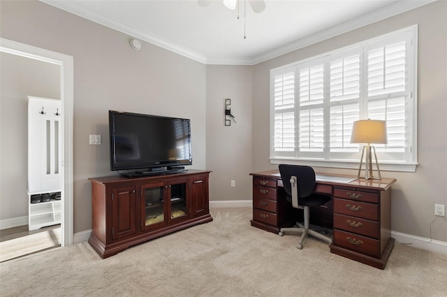 office space with ornamental molding, light carpet, and baseboards