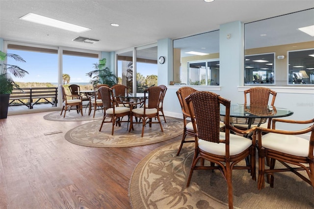 sunroom / solarium featuring a wealth of natural light and visible vents