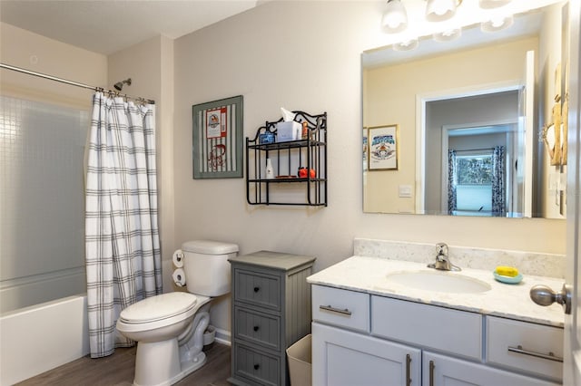 bathroom featuring vanity, shower / bath combination with curtain, wood finished floors, and toilet