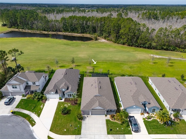 birds eye view of property with a water view, view of golf course, a residential view, and a wooded view