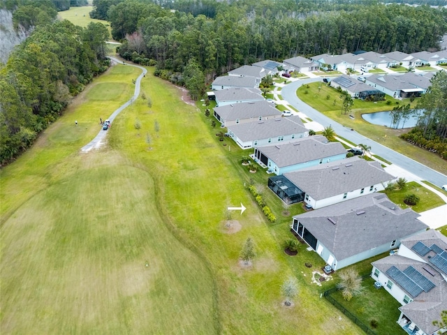 bird's eye view with a water view and a residential view