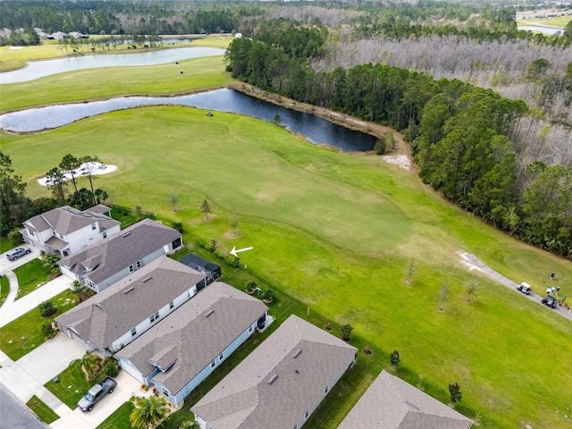 aerial view with view of golf course and a water view