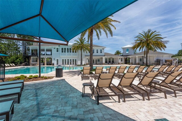 pool with a patio area