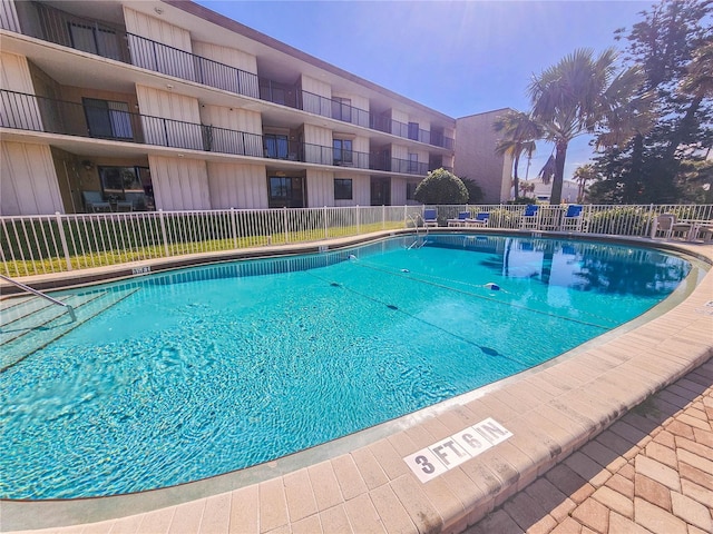 community pool with fence