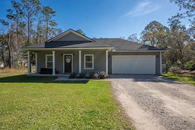 ranch-style house with an attached garage, covered porch, dirt driveway, and a front yard