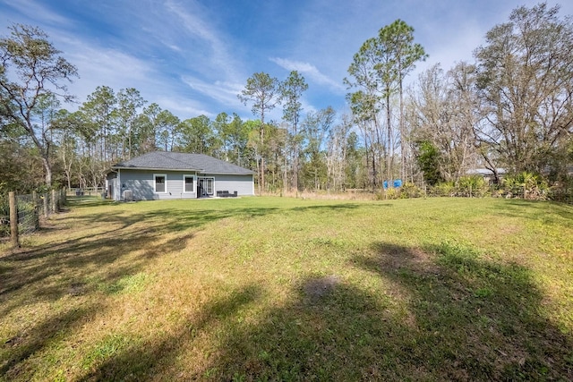 view of yard with fence