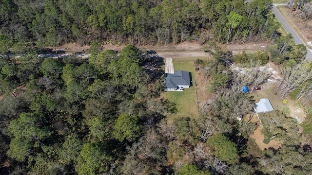 bird's eye view with a view of trees