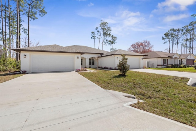 ranch-style home featuring a garage, a front yard, driveway, and stucco siding