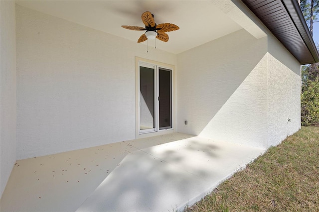 view of patio with ceiling fan