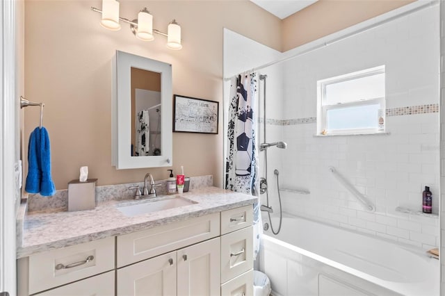 bathroom featuring shower / bathtub combination with curtain and vanity